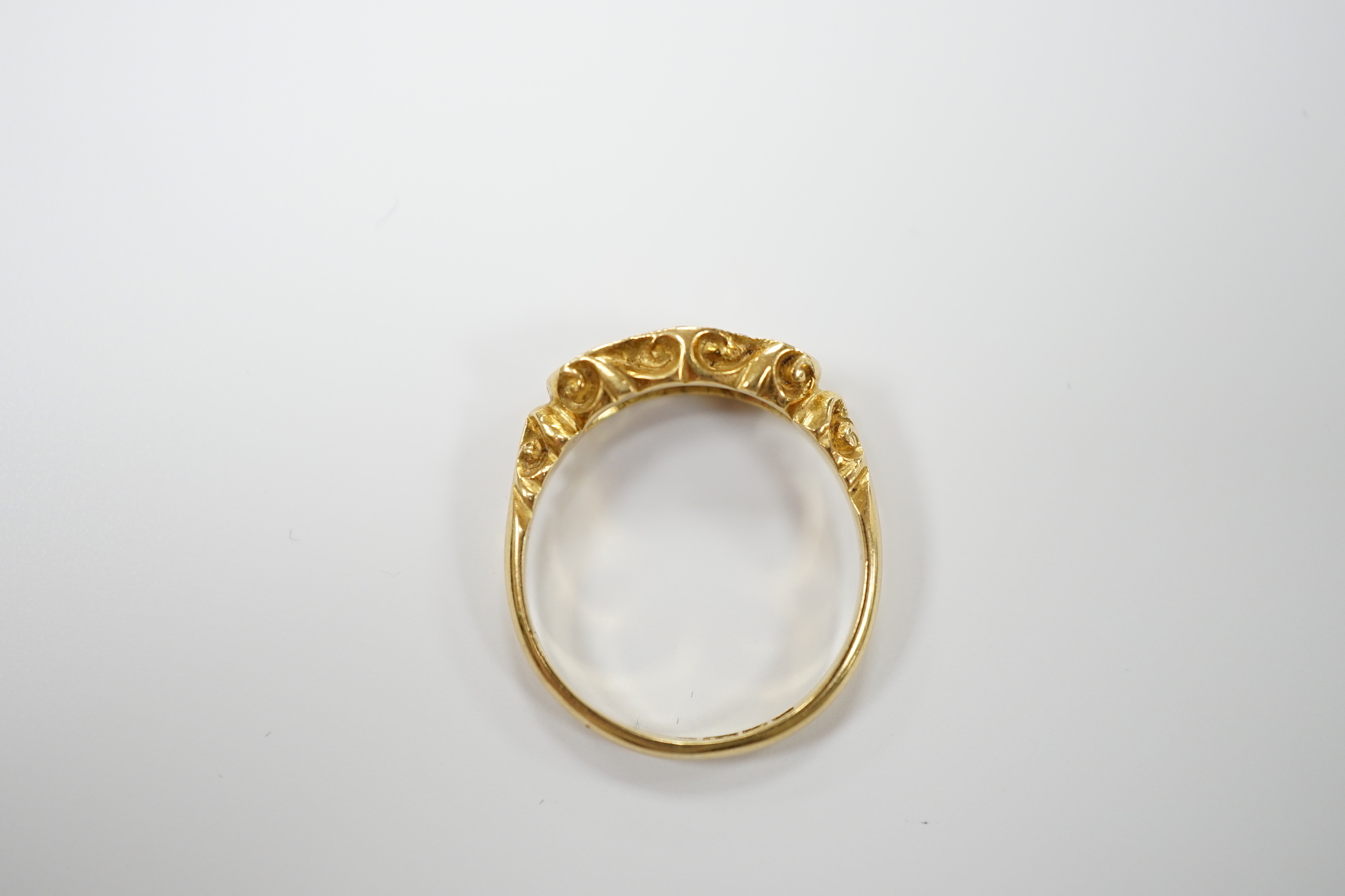 A late Victorian 18ct gold, sapphire and diamond ring, size N, gross weight 3.1 grams.